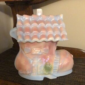 Mother hubbard cookie jar.  11 1/2 h X 11 1/2 L